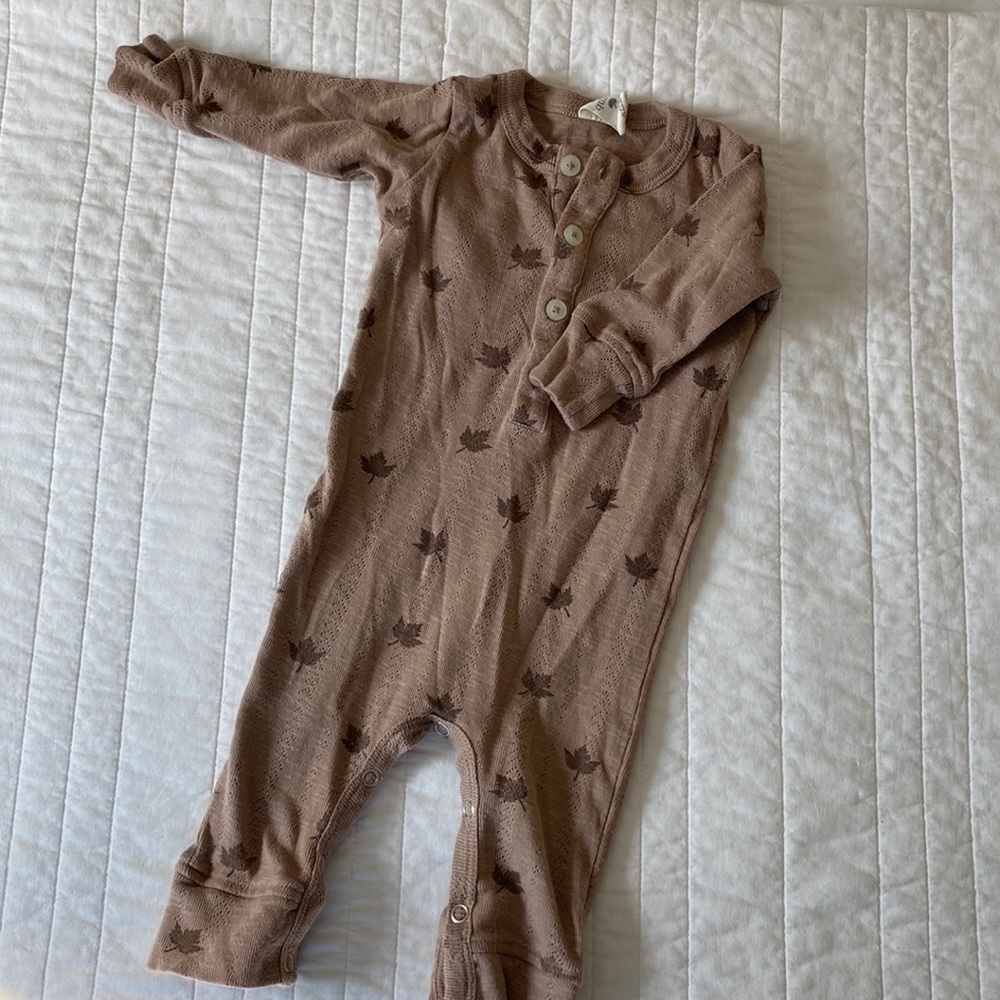 Kate Quinn maple leaf onesie